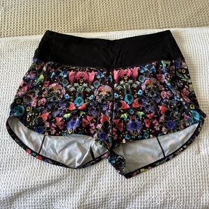 Women’s lululemon size 10 speed up high rise 4” inseam. Flowerscope black/multi